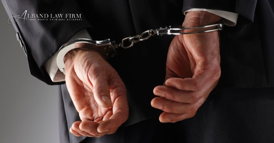 businessman on handcuffs